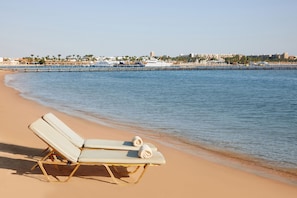Private beach, sun loungers, beach umbrellas, beach towels