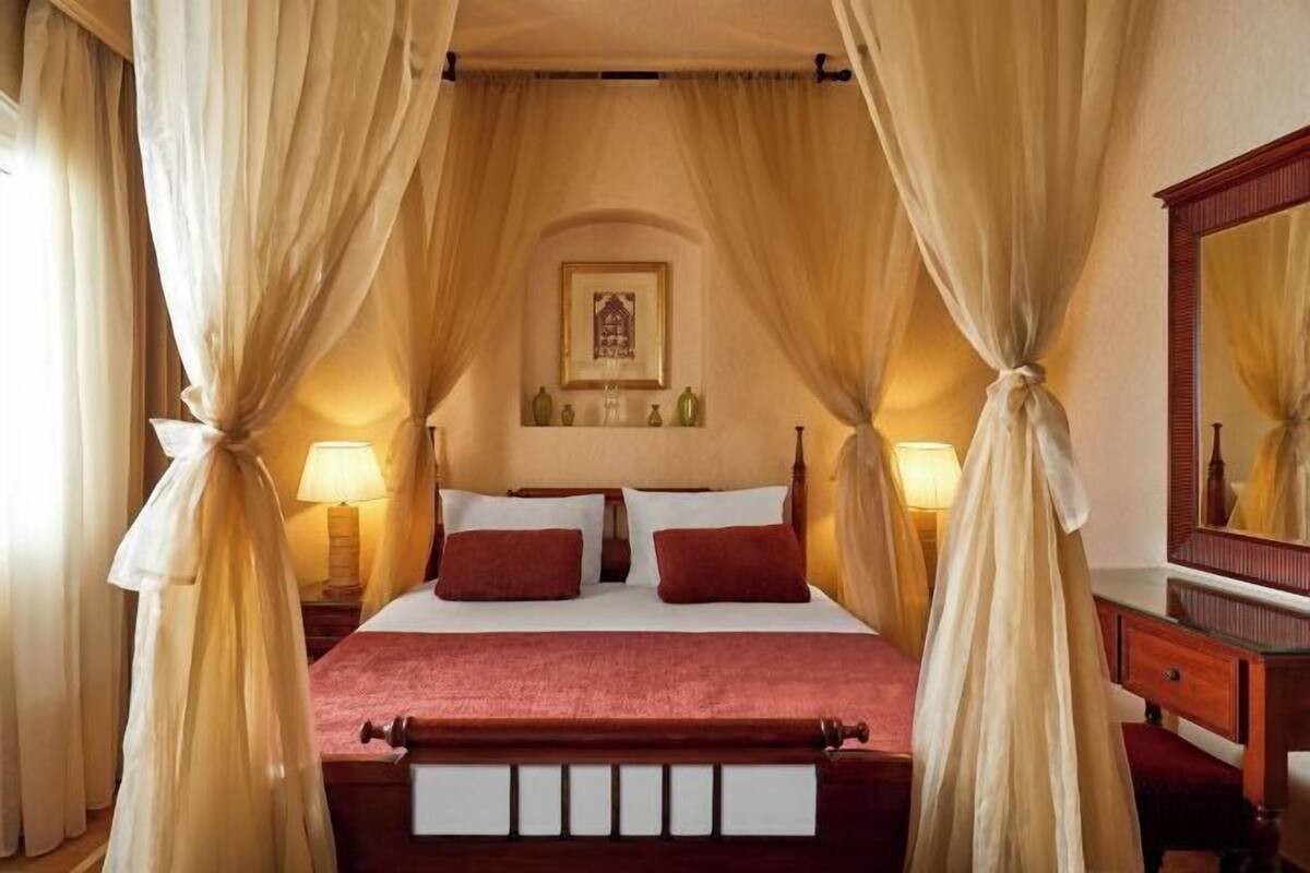 Pillow-top beds, minibar, in-room safe, desk