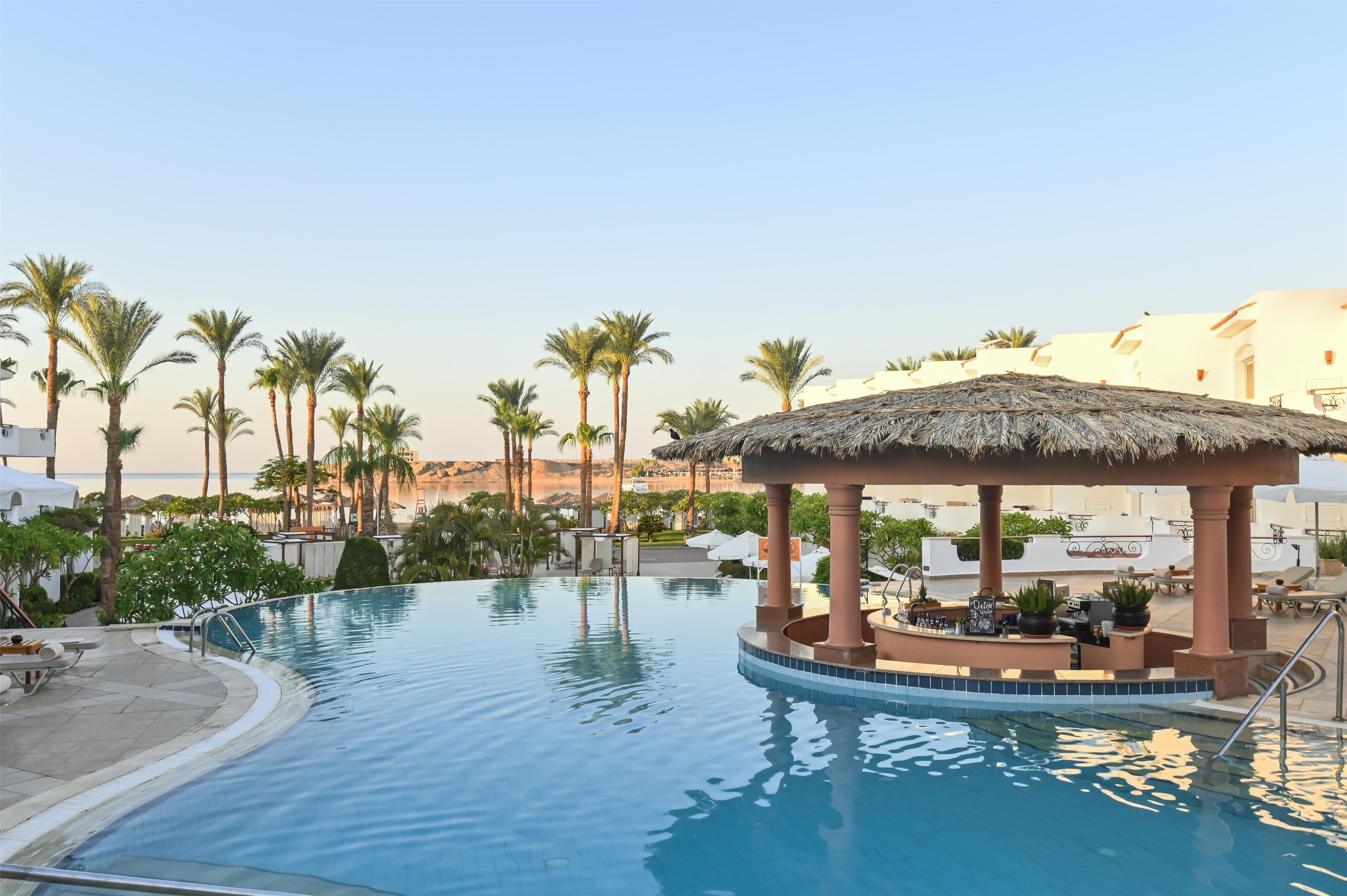 Indoor pool, 2 outdoor pools, open 8 AM to 6 PM, pool umbrellas