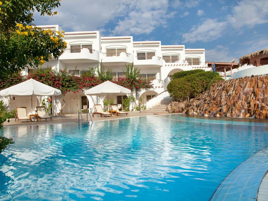 Indoor pool, 2 outdoor pools, open 8 AM to 6 PM, pool umbrellas