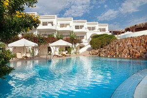 Indoor pool, 2 outdoor pools, open 8 AM to 6 PM, pool umbrellas