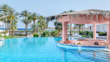 Indoor pool, 2 outdoor pools, open 8 AM to 6 PM, pool umbrellas