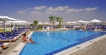 Outdoor pool, pool umbrellas, pool loungers