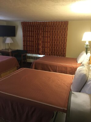 Family Room, Multiple Beds | Premium bedding, memory-foam beds, blackout curtains, iron/ironing board - Caravan Motel (Niagara Falls)