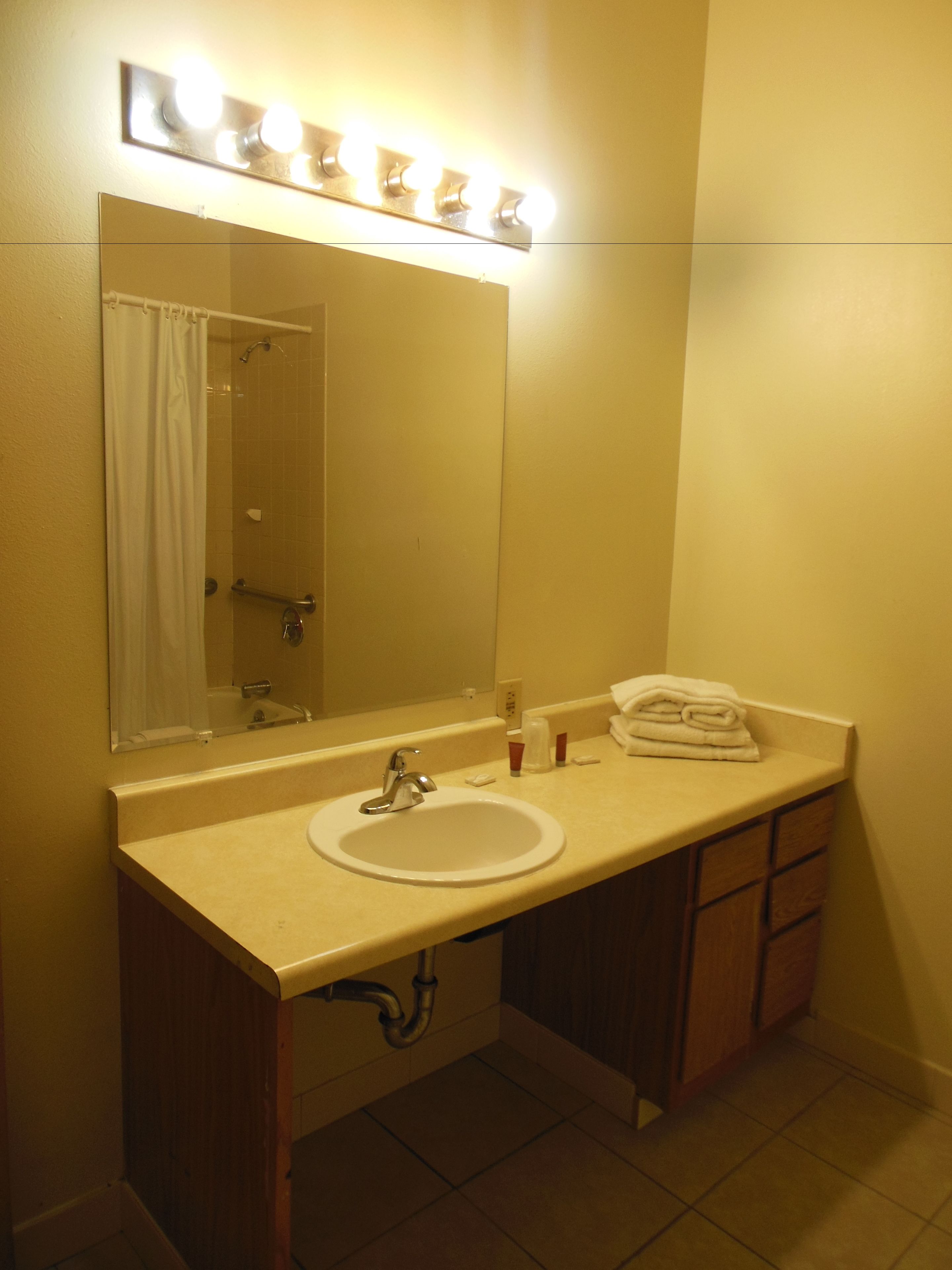 room, 1 queen bed, private bathroom | bathroom sink