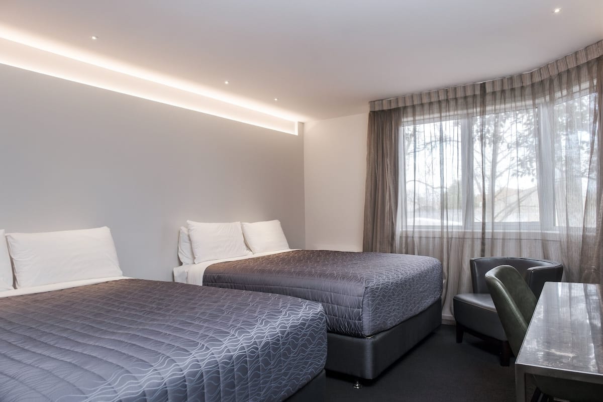 Room, 2 Double Beds, Non Smoking | Minibar, in-room safe, desk, blackout drapes