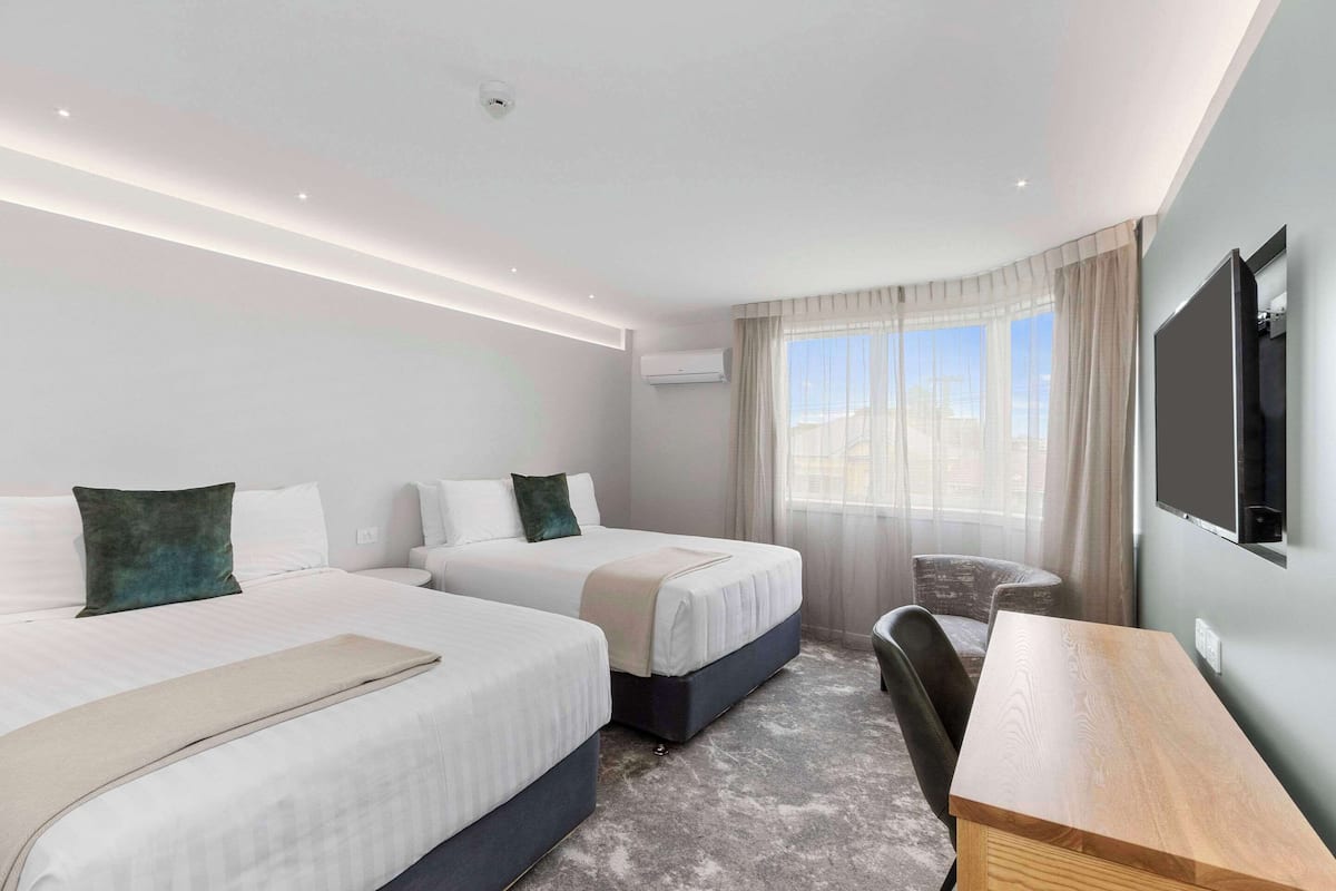 Room, 2 Double Beds, Non Smoking (Upgrade) | Minibar, in-room safe, desk, blackout drapes