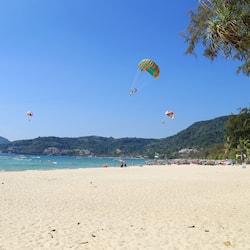 On the beach, white sand, beach towels
