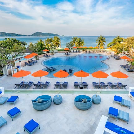 2 outdoor pools, open 8:00 AM to 7:00 PM, pool umbrellas, pool loungers