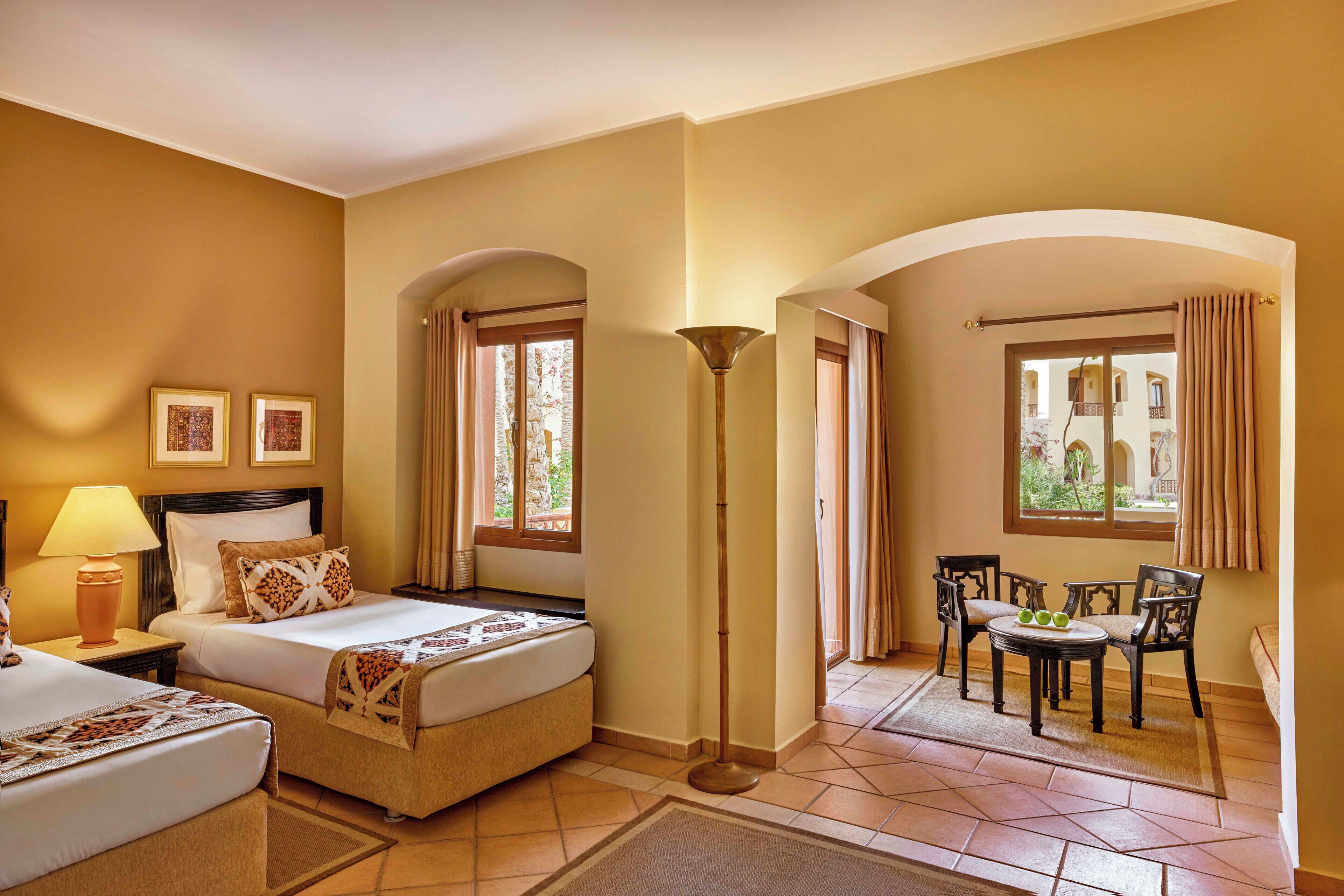 deluxe room, garden view (queen or twin) | 1 bedroom, in-room safe, individually decorated, individually furnished