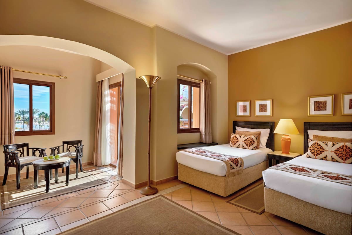 deluxe room, sea view (queen or twin) | 1 bedroom, in-room safe, individually decorated, individually furnished