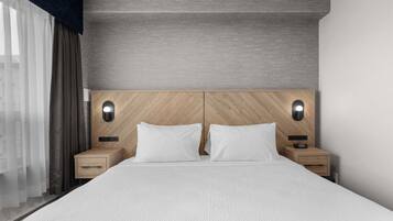 Standard Suite, 1 King Bed with Sofa bed, Kitchenette | In-room safe, desk, blackout curtains, iron/ironing board