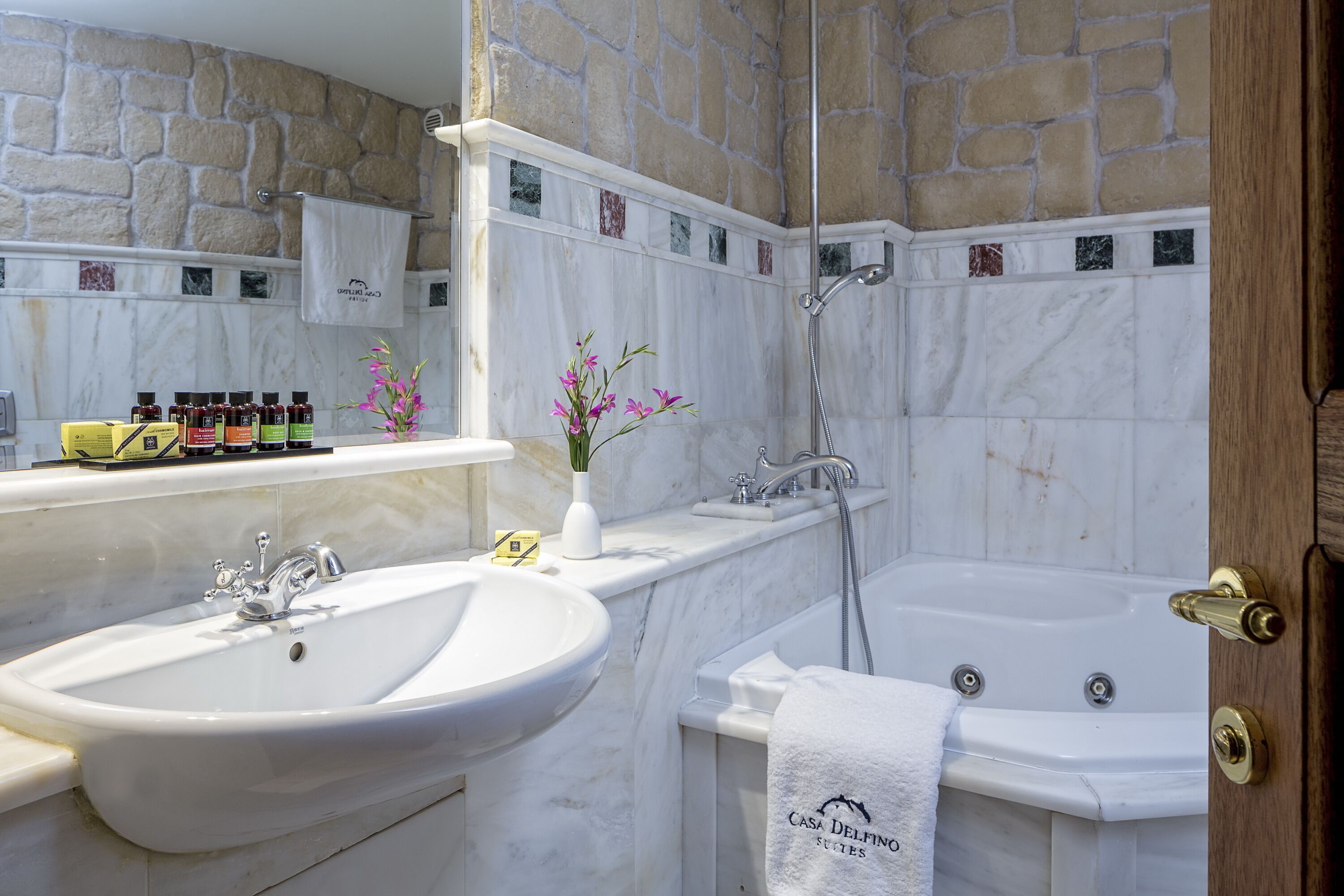 family suite | bathroom | deep-soaking bathtub, eco-friendly toiletries, hair dryer, bathrobes