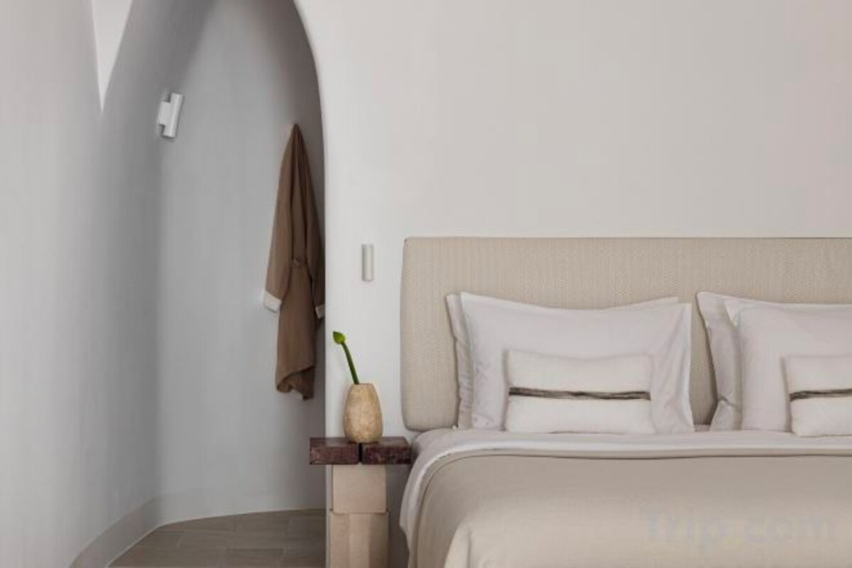 Ropa de cama de alta calidad, minibar, caja fuerte y cortinas opacas