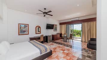 King Room with Garden View and Balcony | In-room safe, individually decorated, individually furnished