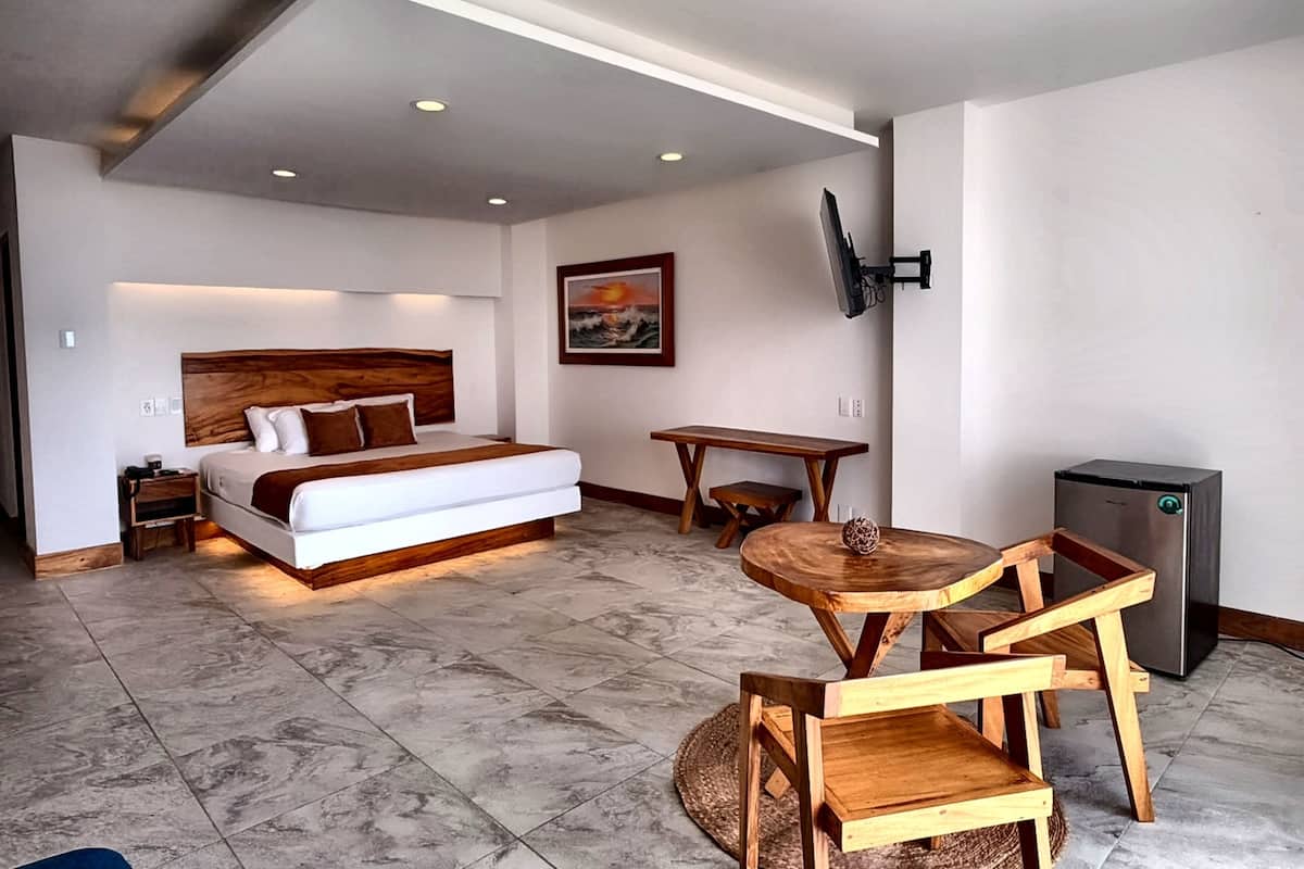 Luxe suite | Een kluis op de kamer, verduisterende gordijnen