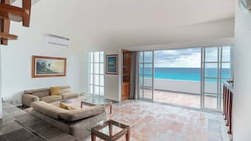 Two Bedroom Ocean View | Living area | 42-inch flat-screen TV with satellite channels, TV