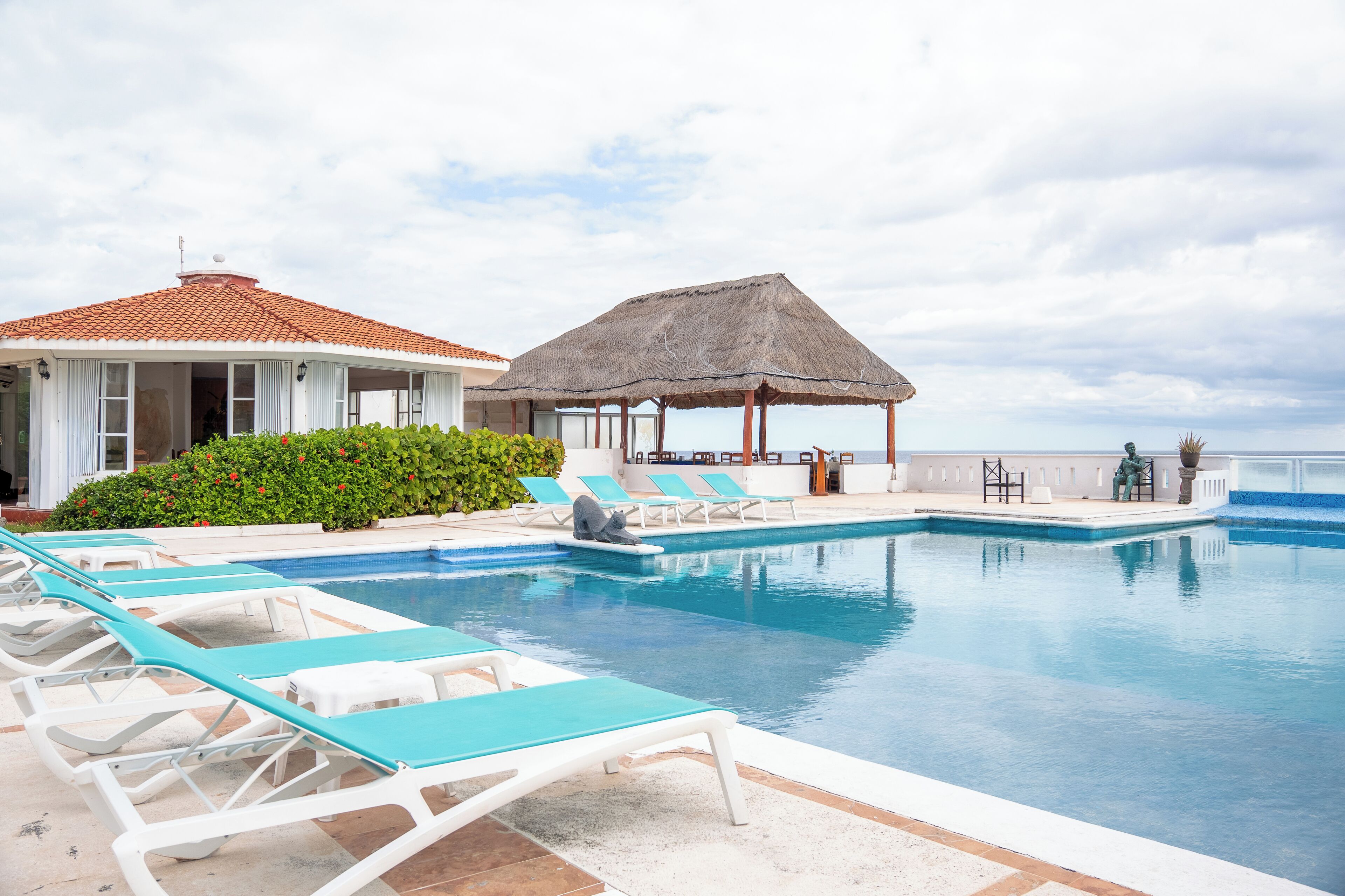 Outdoor pool, pool umbrellas, sun loungers
