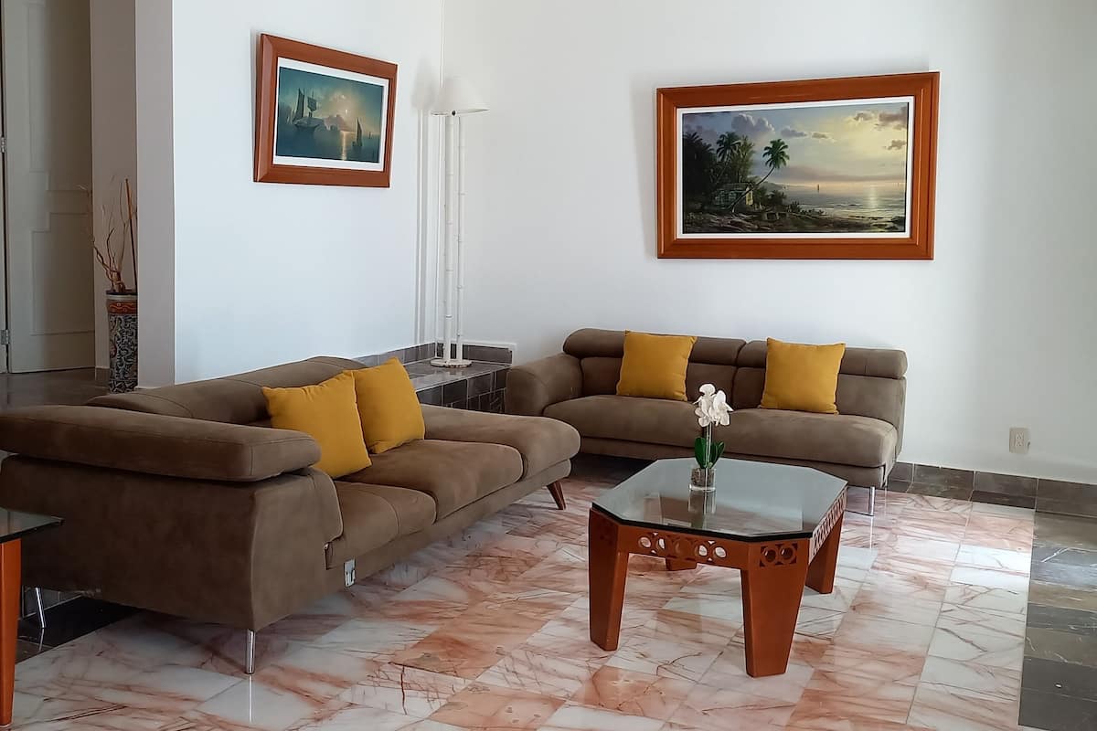Presidential Suite | Living area | 42-inch flat-screen TV with satellite channels, TV