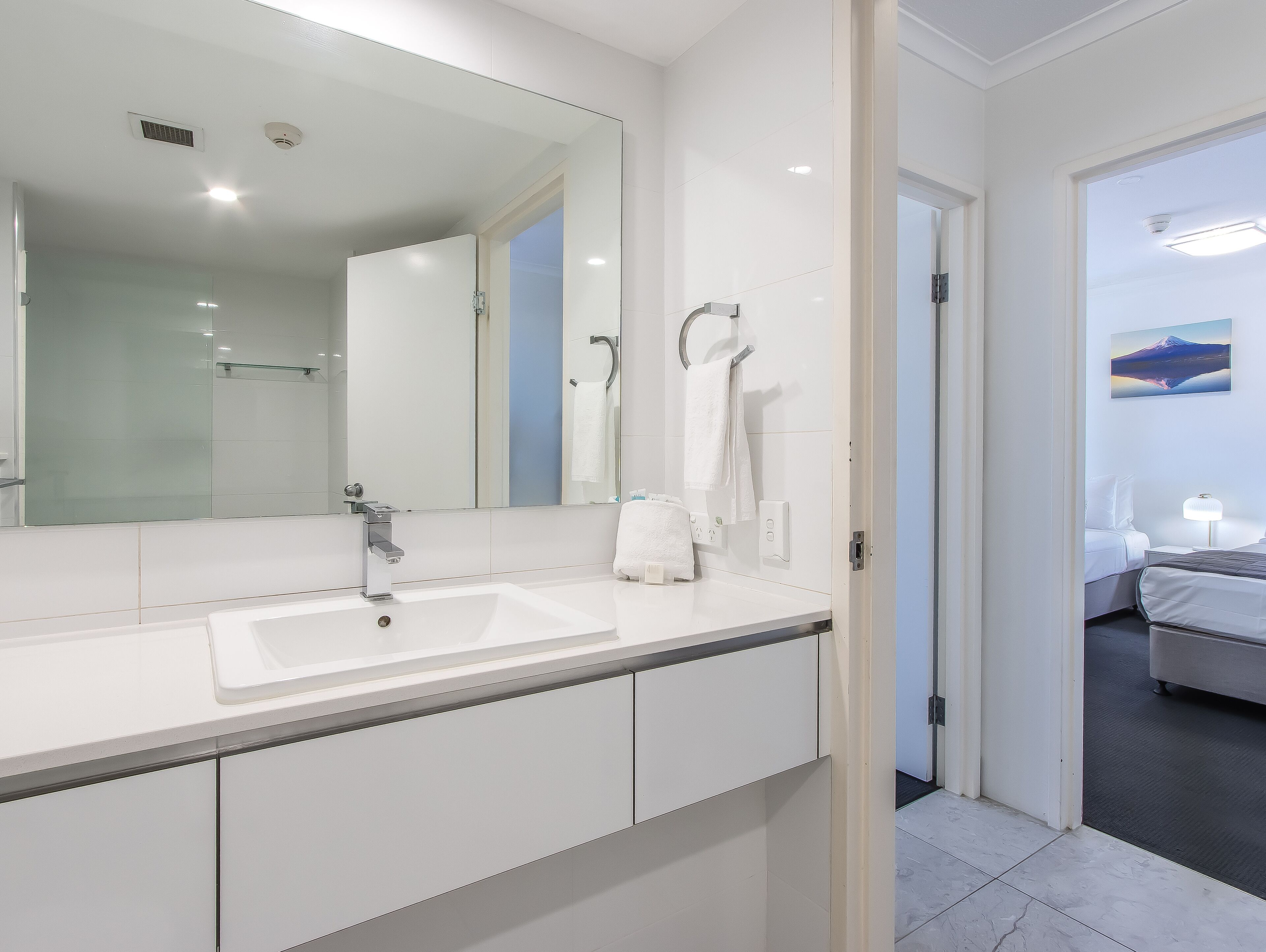 2 bedroom ocean view sub-penthouse | bathroom | separate bathtub and shower, hair dryer, towels