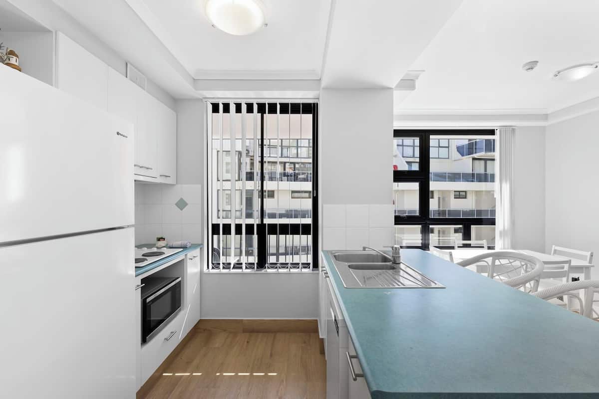 superior apartment | private kitchen | full-sized fridge, microwave, stovetop, dishwasher