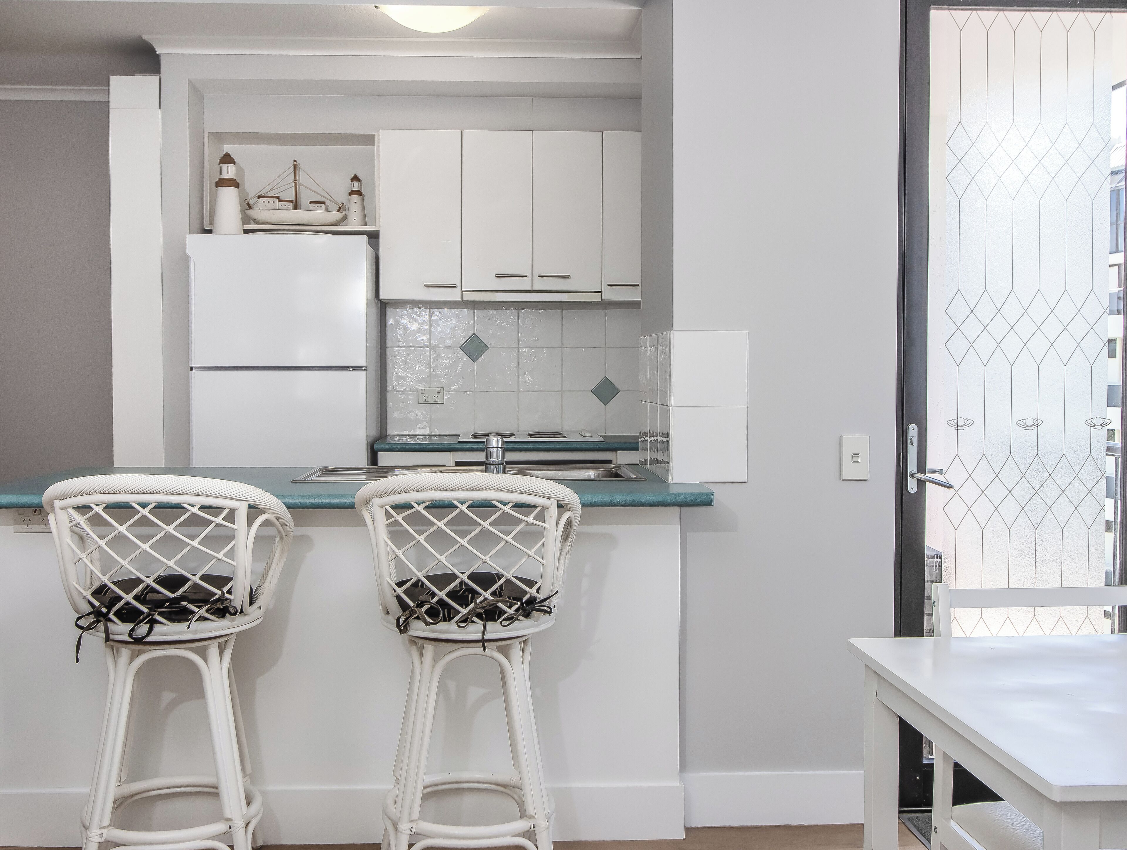 full-sized fridge, microwave, stovetop, dishwasher