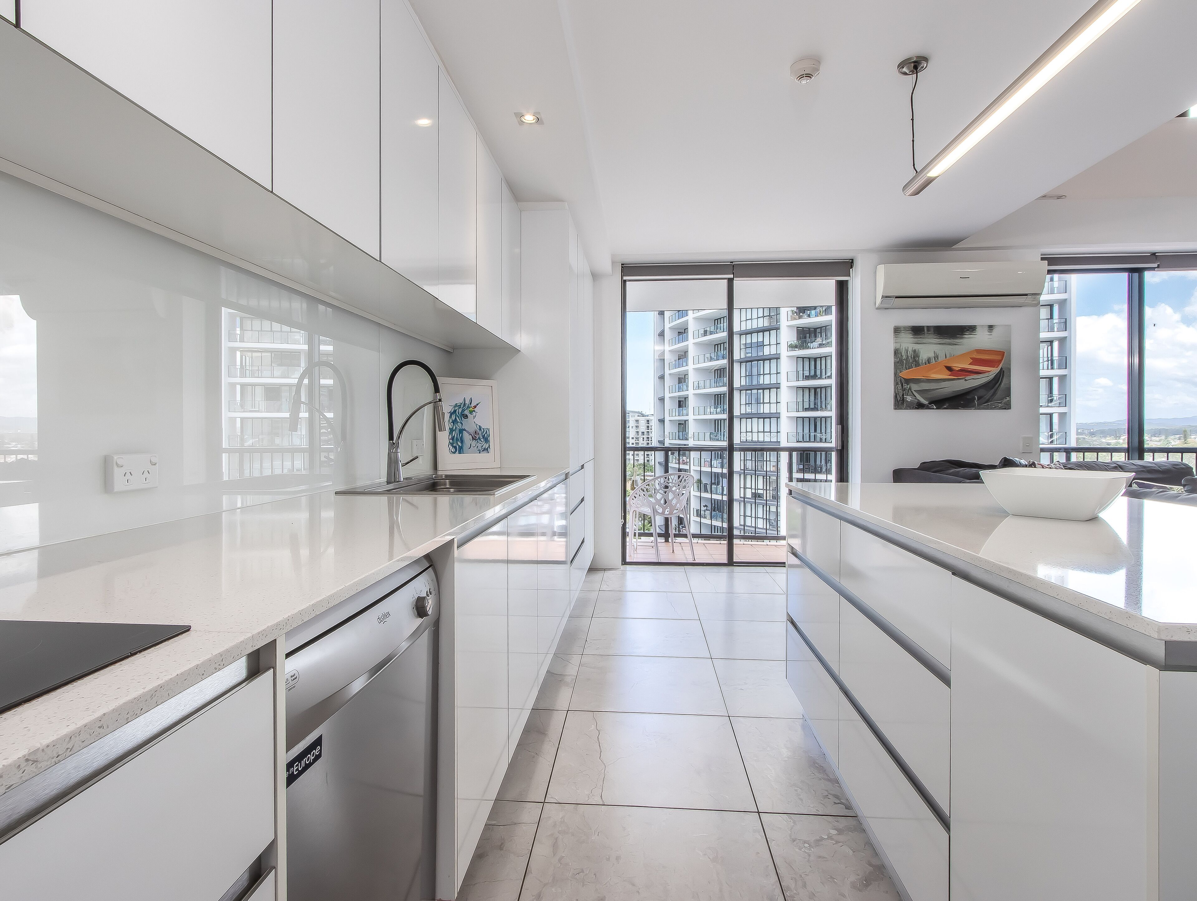 2 bedroom ocean view sub-penthouse | private kitchen | full-sized fridge, microwave, stovetop, dishwasher