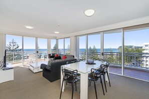 2 Bed Superior Ocean View (No Air-Con) | Living area | Flat-screen TV, DVD player
