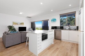 Superior Two Bedroom Apartment	 | Living area | TV - Noosa International Resort (Noosa Heads)