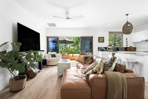 Deluxe Apartment | Living area | TV