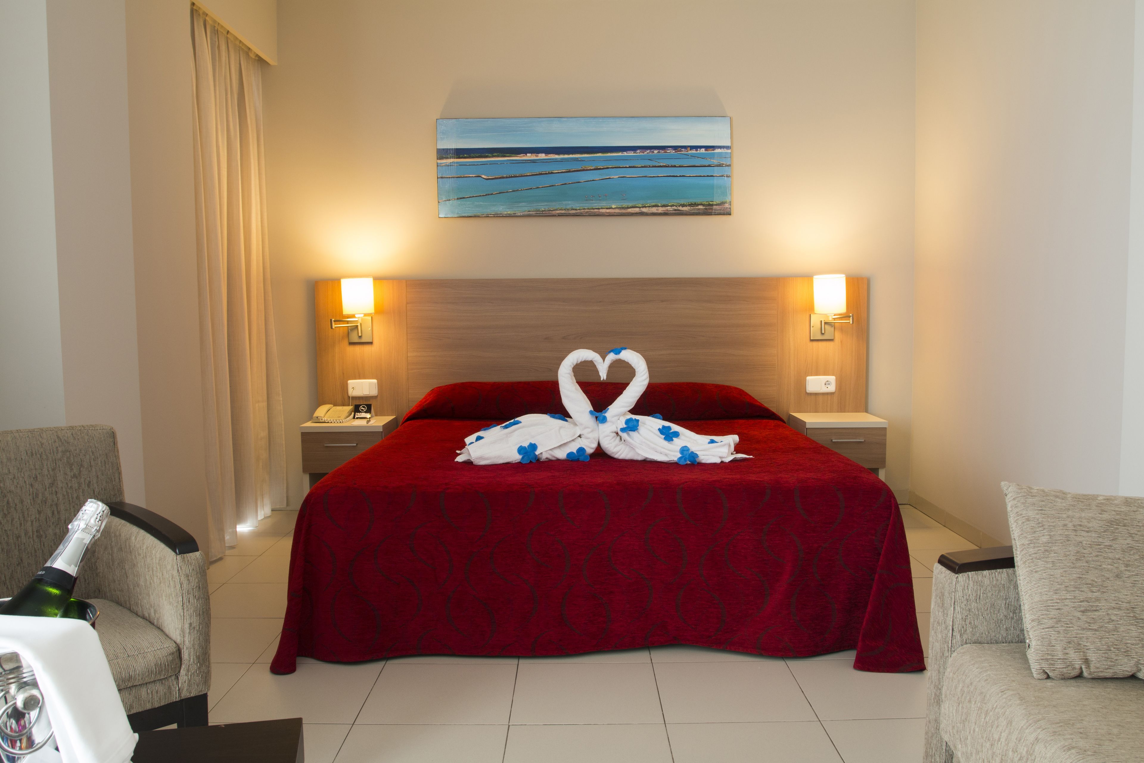 Junior Suite | Down comforters, in-room safe, desk, laptop workspace