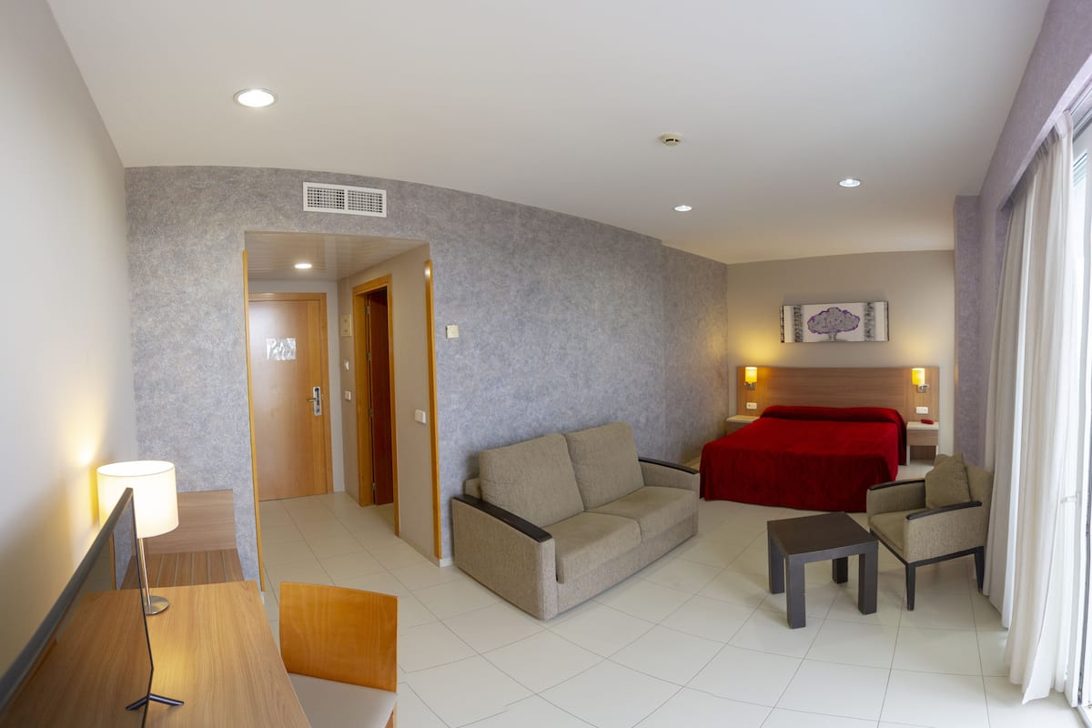 junior suite | 1 bedroom, down duvets, in-room safe, desk