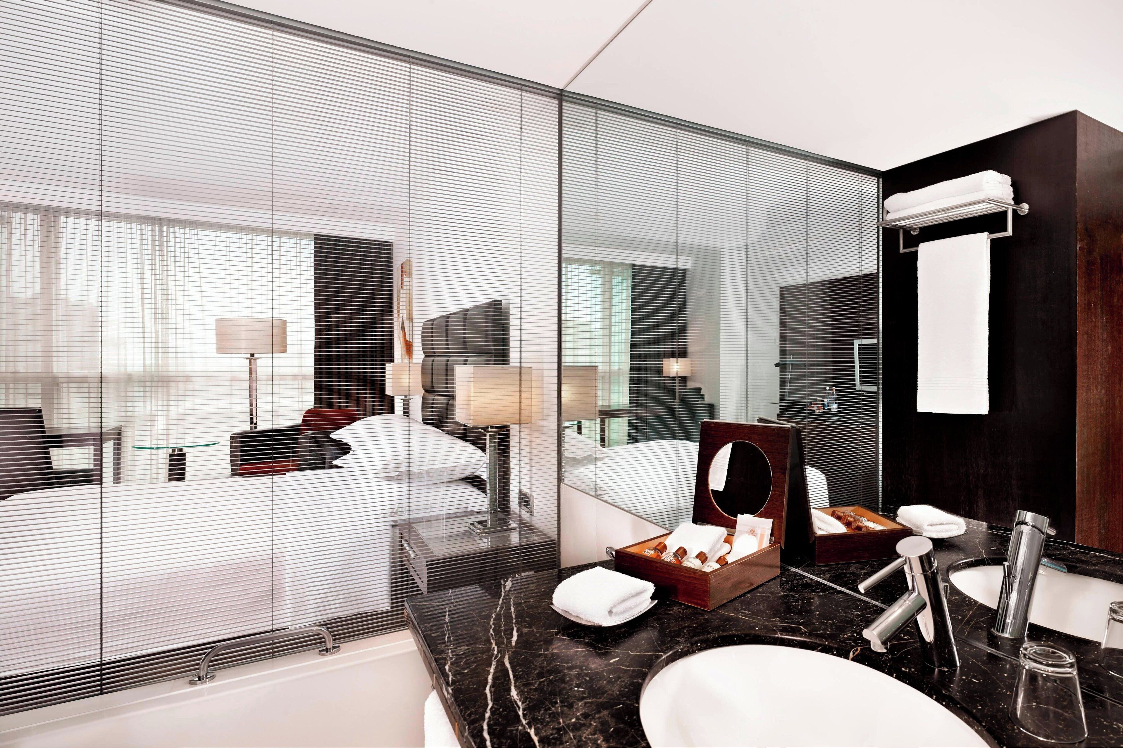 combined shower/bathtub, deep-soaking bathtub, rainfall showerhead