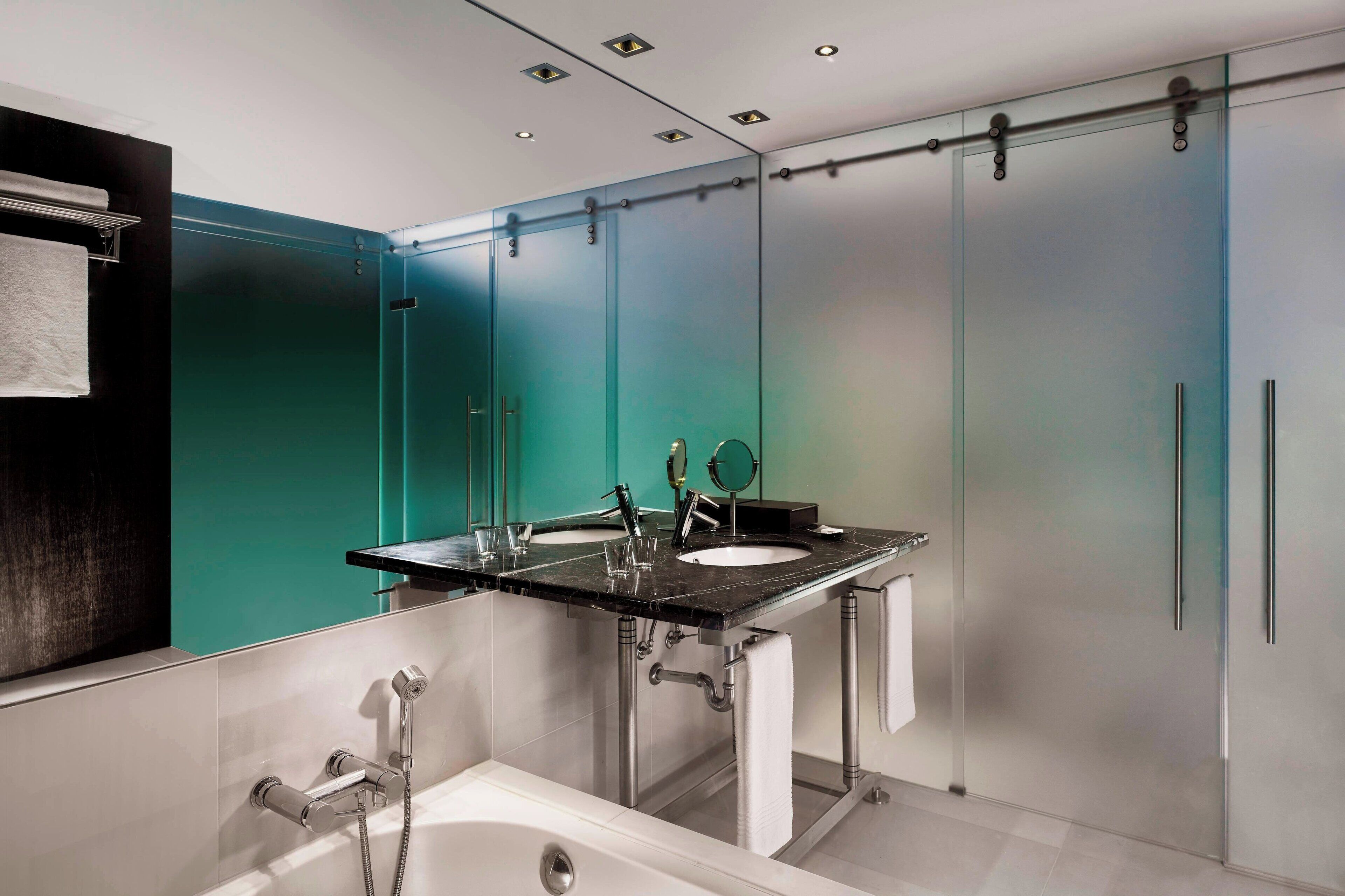 combined shower/bathtub, deep-soaking bathtub, rainfall showerhead