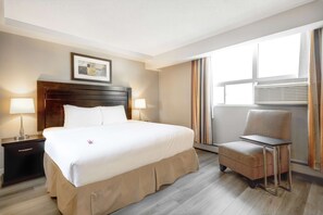 Estúdio premium, 1 cama King | 1 quarto, roupas de cama premium, cofres nos quartos, escrivaninha