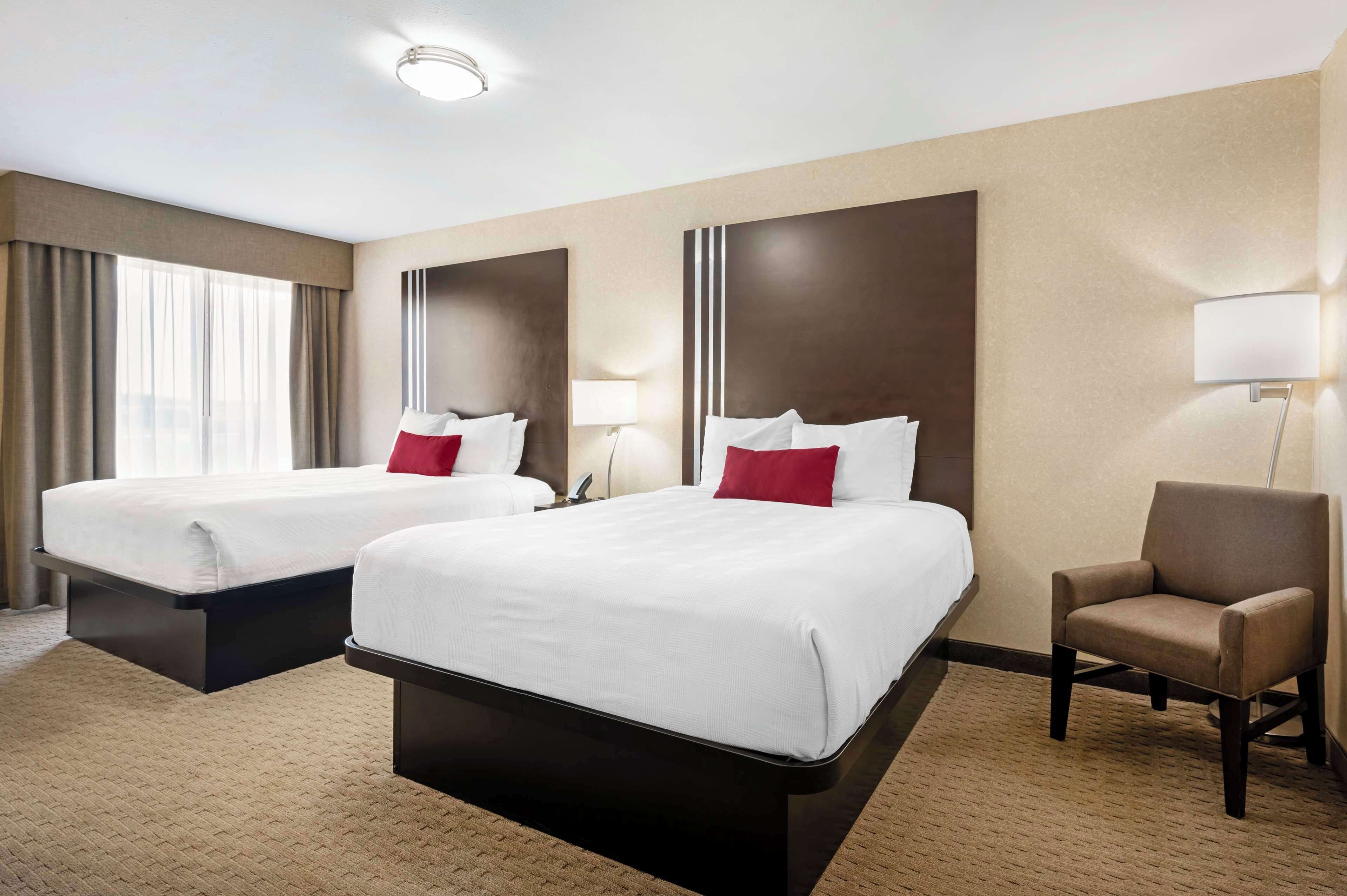 family suite, 2 queen beds, non smoking, kitchenette | premium bedding, pillow-top beds, desk, iron/ironing board