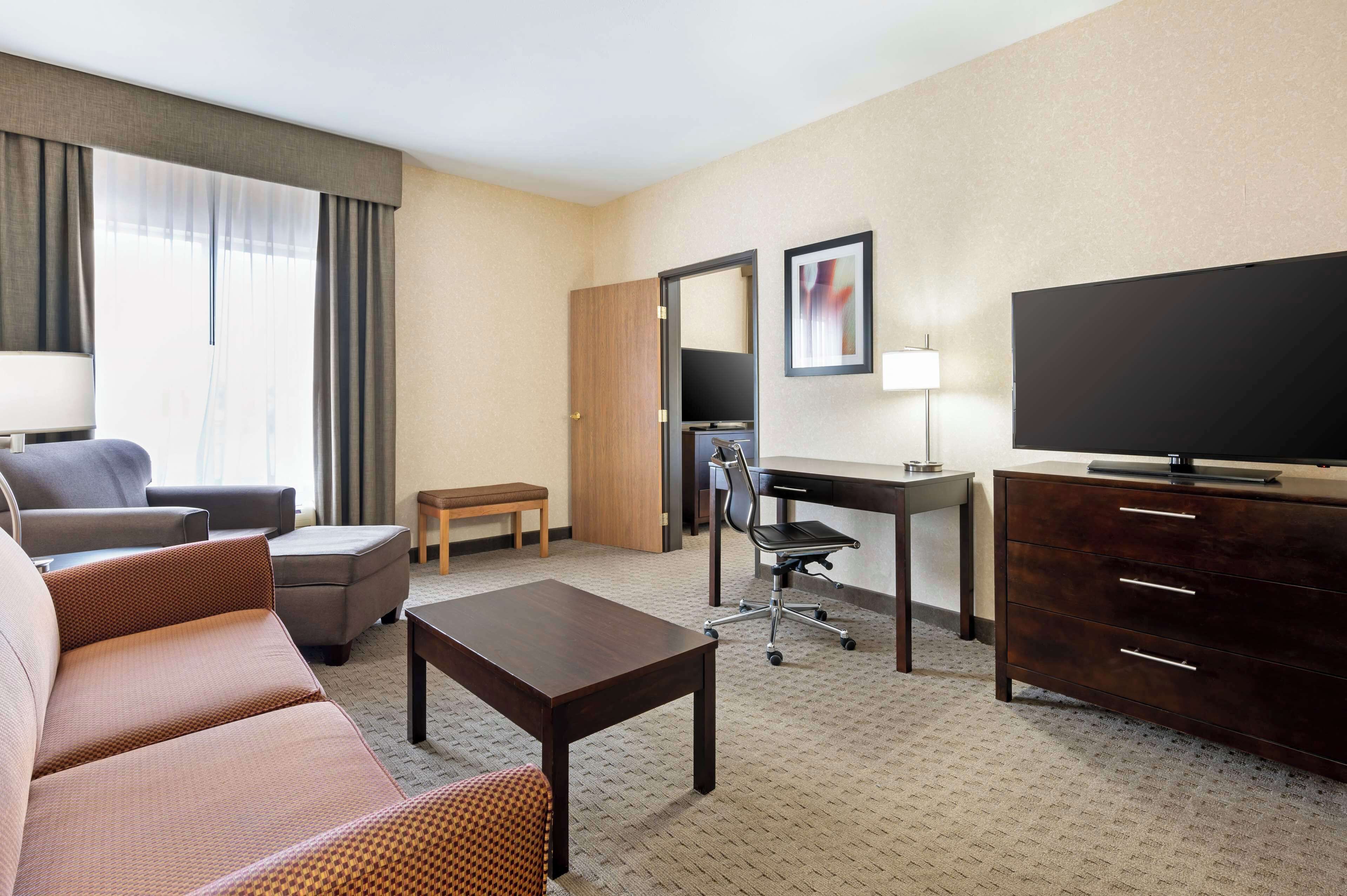 suite, 1 king bed, non smoking, refrigerator & microwave (living room) | premium bedding, pillow-top beds, desk, iron/ironing board