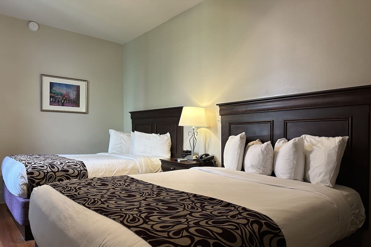 Deluxe Room, 2 Queen Beds | Premium bedding, pillowtop beds, individually decorated, desk