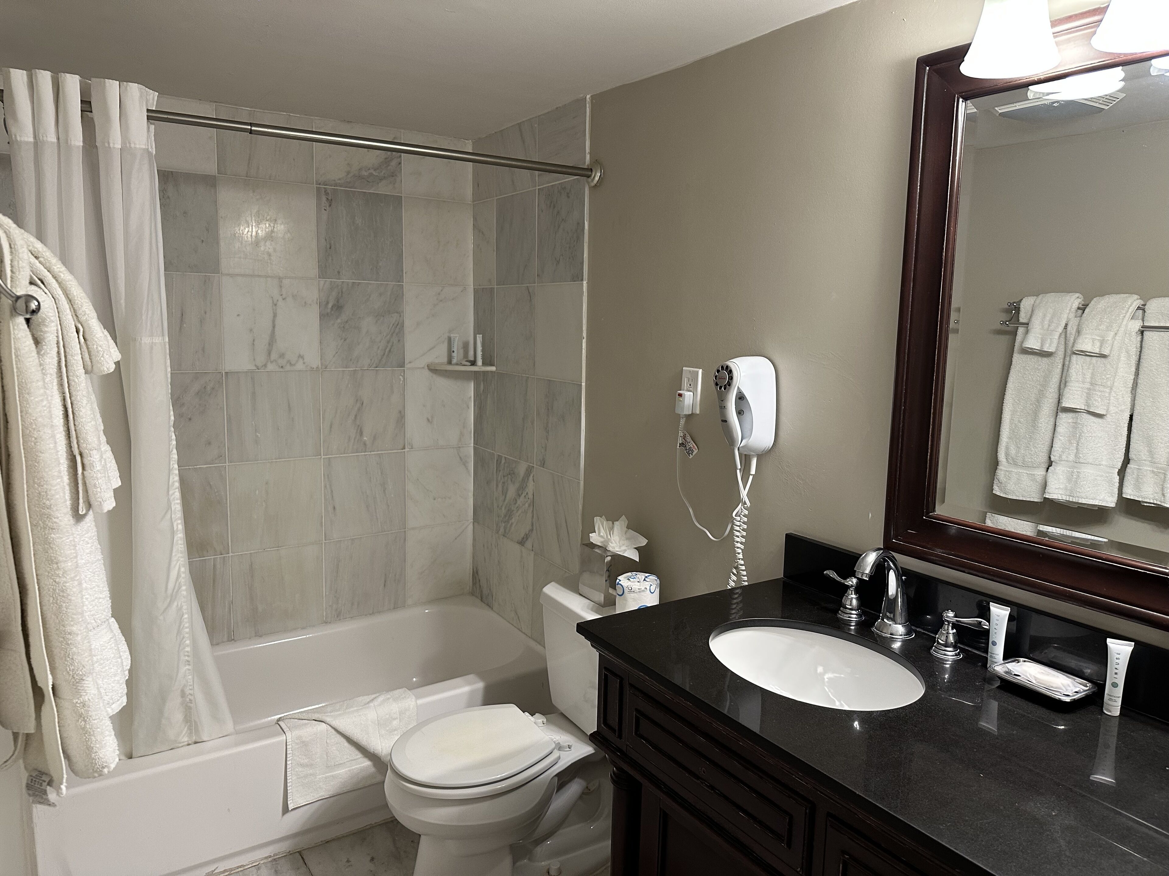 deluxe room, 2 queen beds | bathroom | combined shower/bathtub, free toiletries, hair dryer, towels