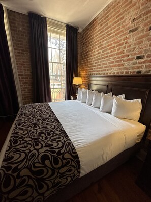 Suite, 1 King Bed with Sofa bed, Non Smoking | Premium bedding, pillowtop beds, individually decorated, desk