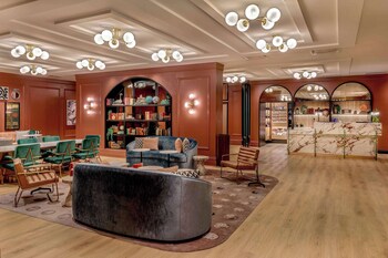 Hotel entrance and lobby at Pennyweight Hotel Boston, Curio Collection by Hilton
