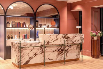 Reception area at Pennyweight Hotel Boston, Curio Collection by Hilton