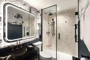 Combined shower/tub, designer toiletries, hair dryer, bathrobes