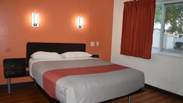 Bañera con ducha, toallas