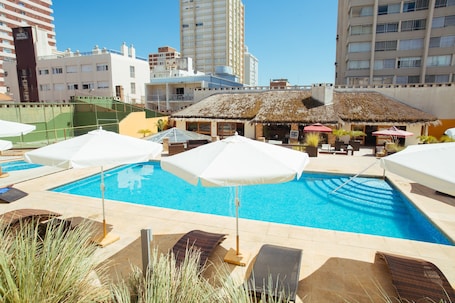 Indoor pool, outdoor pool, open 8:00 AM to 10 PM, pool umbrellas