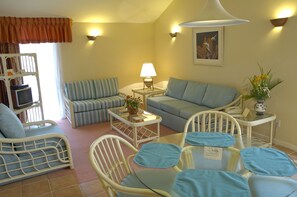 32-inch flat-screen TV with cable channels, TV