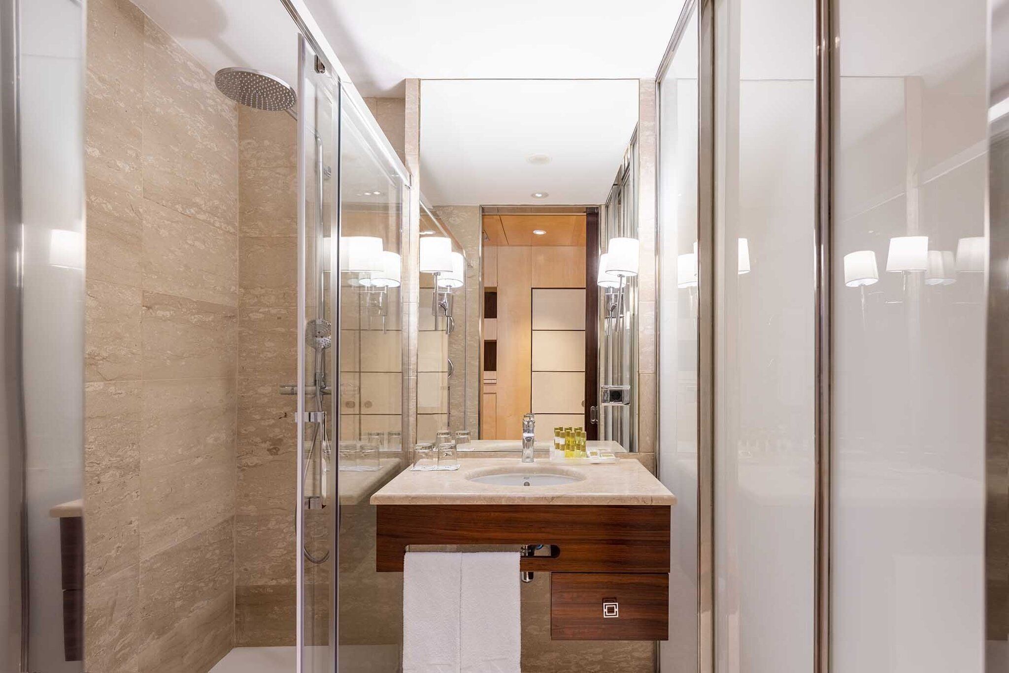 shower, eco-friendly toiletries, hair dryer, towels