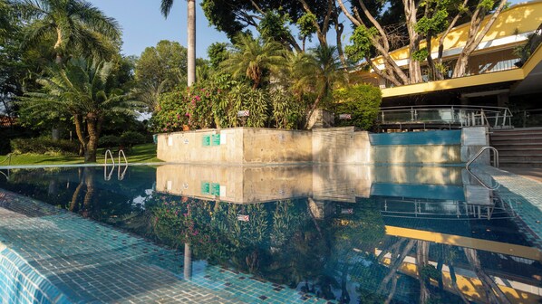 2 outdoor pools, open 8:00 AM to 9:00 PM, pool umbrellas, sun loungers