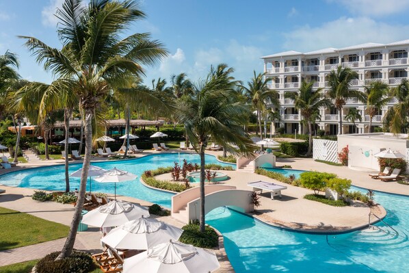 Outdoor pool, pool umbrellas, sun loungers
