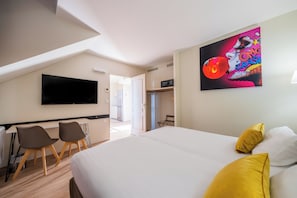 Departamento estándar, 1 cama individual, para no fumadores (Appartement 1 Lit Double 2 Lit Simple) | Ropa de cama de alta calidad, escritorio y cortinas blackout